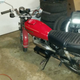 Illustration for article titled Unnecessary Motorcycle Window Sho...Wait, is That a DIESEL?